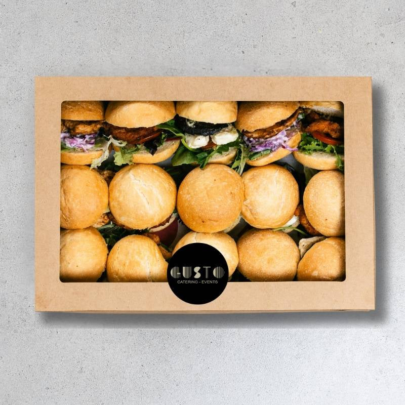 Box of mini burgers with 'Gusto Catering Events' logo on a gray background
