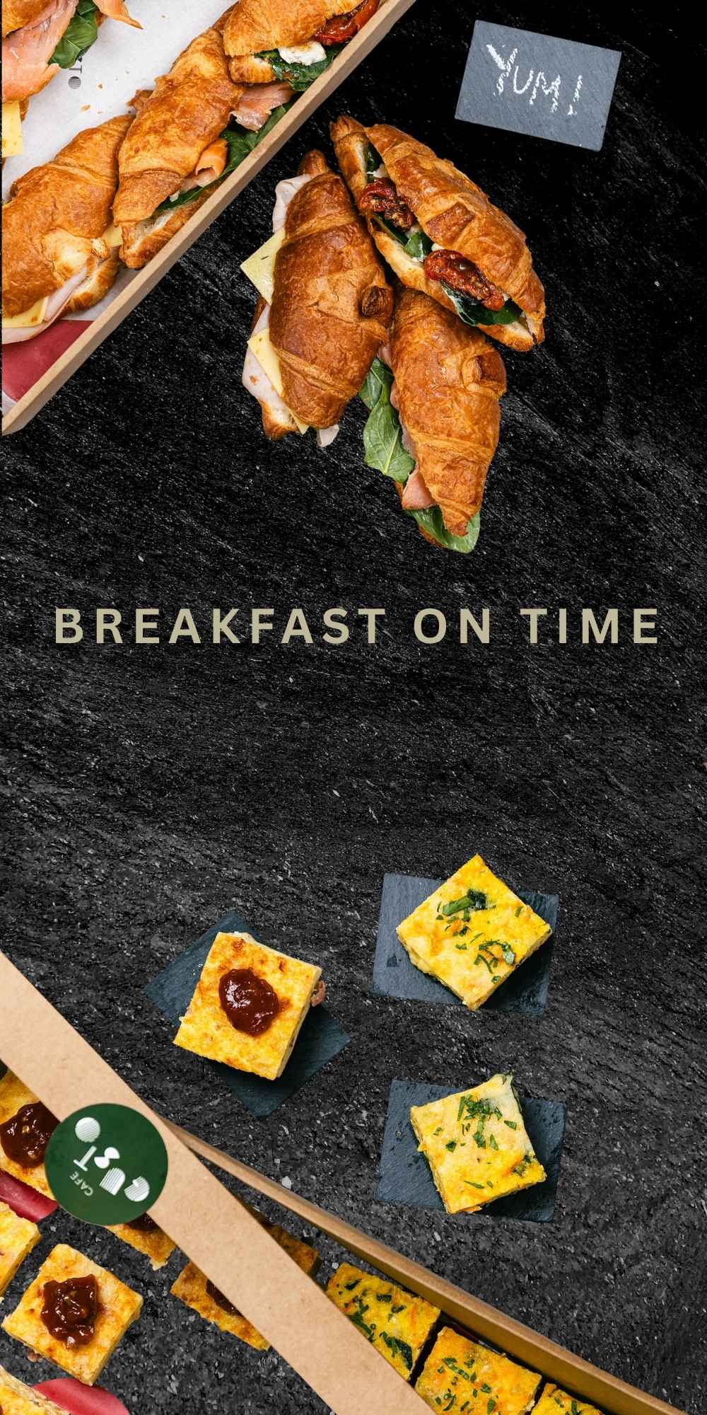 Breakfast items including sandwiches and pastries on a dark surface with 'Yum!' text.