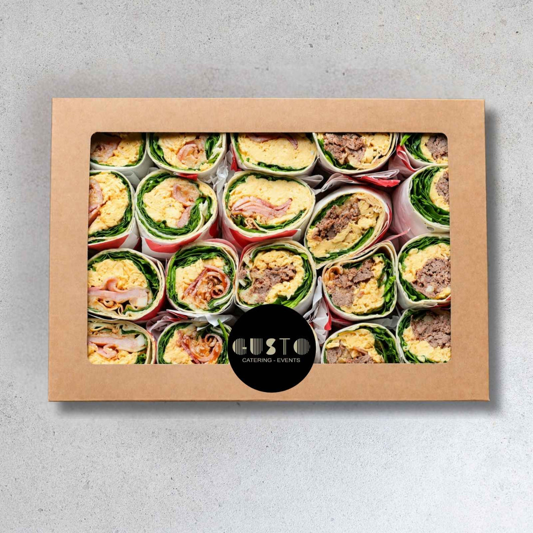 Box of assorted wrap slices with 'Custo' branding on a gray background