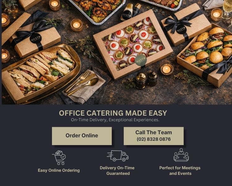Office catering boxes with food items on a rustic surface, featuring text and contact information for ordering.